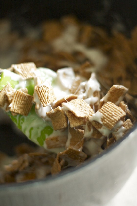 S'mores graham krispie treats - in a  mixing bowl with green spatula