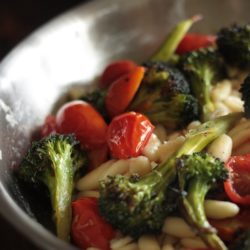 Roasted Tomato and Broccoli Summer pasta skillet cooking in a pan