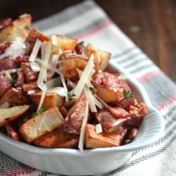 Roasted Potatoes with Bacon Parmesan Vinaigrette in a dish