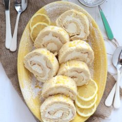 Lemon Roll Cake - www.countrycleaver.com This may look hard, but it's SUPER EASY to do!! You will love it! #lemon