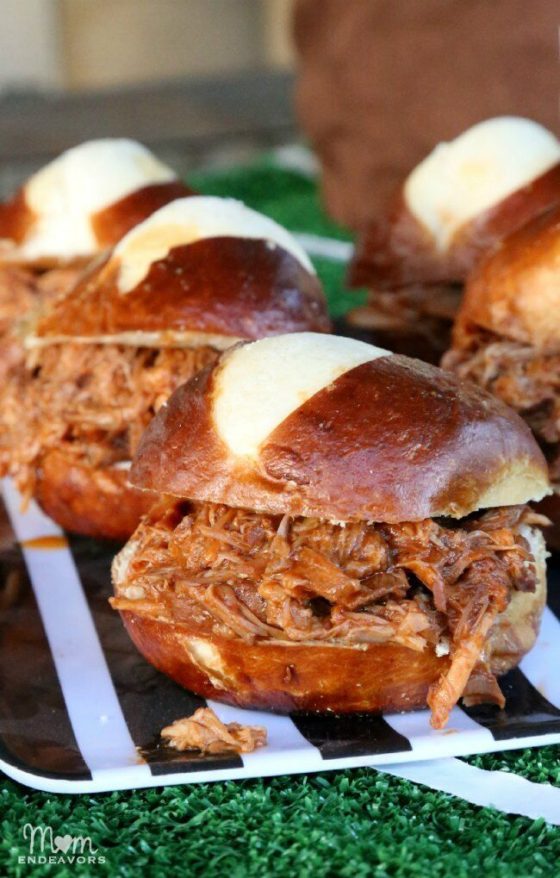Slow Cooker Pulled Pork Pretzel Bun Sliders + 15 More Slow Cooker Appetizers for Game Day- www.countrycleaver.com