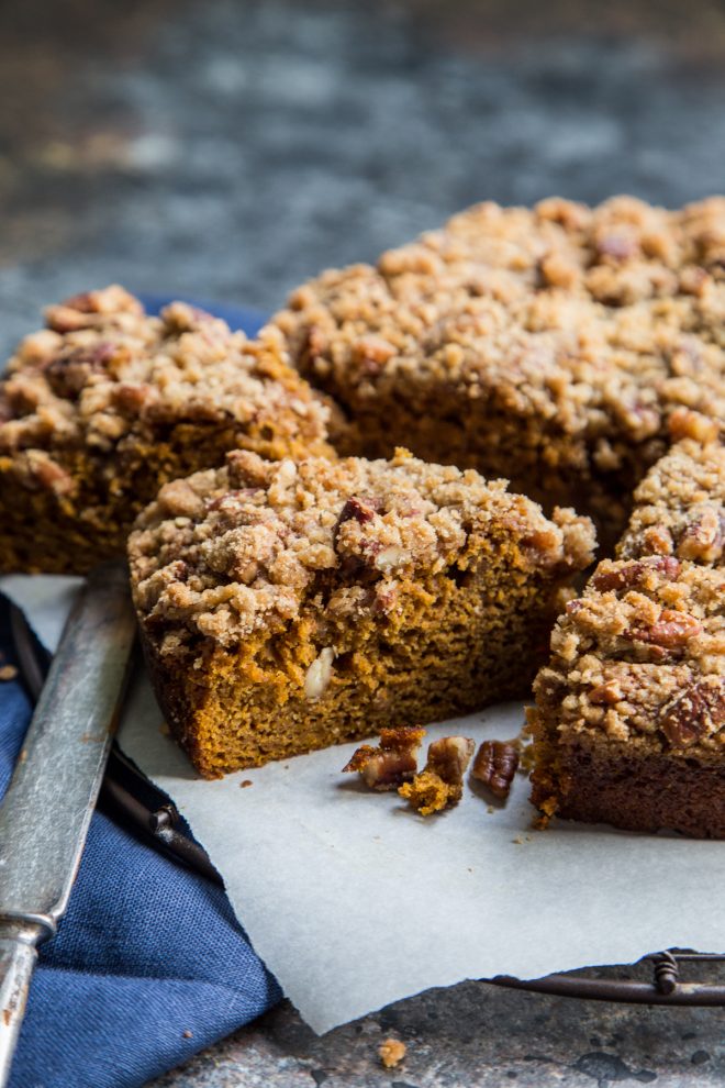 Pumpkin Gingerbread Coffee Cake slices on a blue background