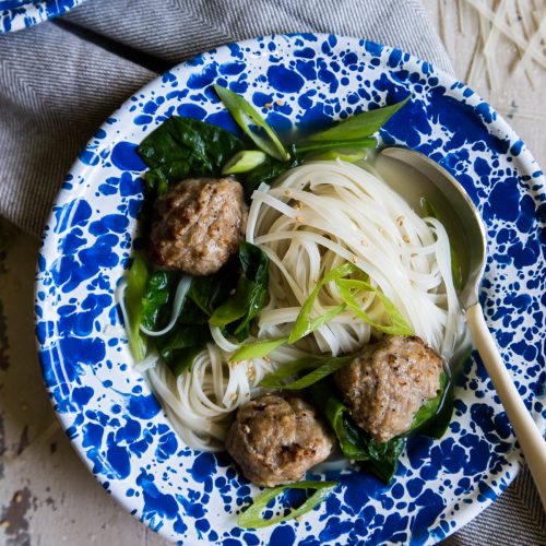 20 Minute teriyaki meatball noodle bowls in blue bowls with rice noodles