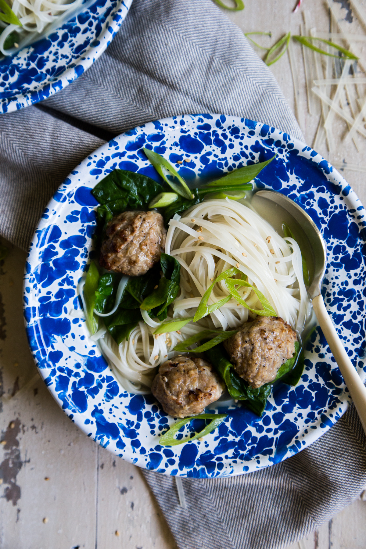 20 Minute teriyaki meatball noodle bowls in blue bowls with rice noodles