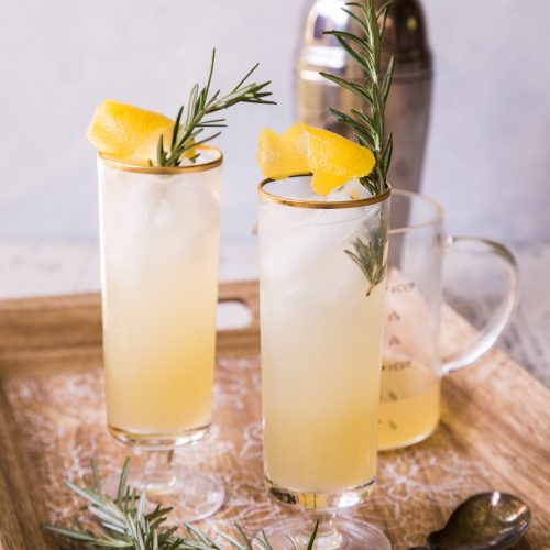 Homemade Rosemary Lemonade Spritzer Cocktail with cocktail shaker