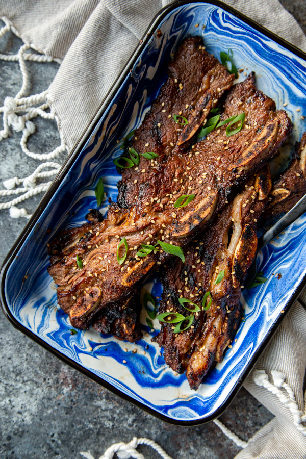 Asian Grilled Flanken Short Ribs shot overheat in blue and white dish
